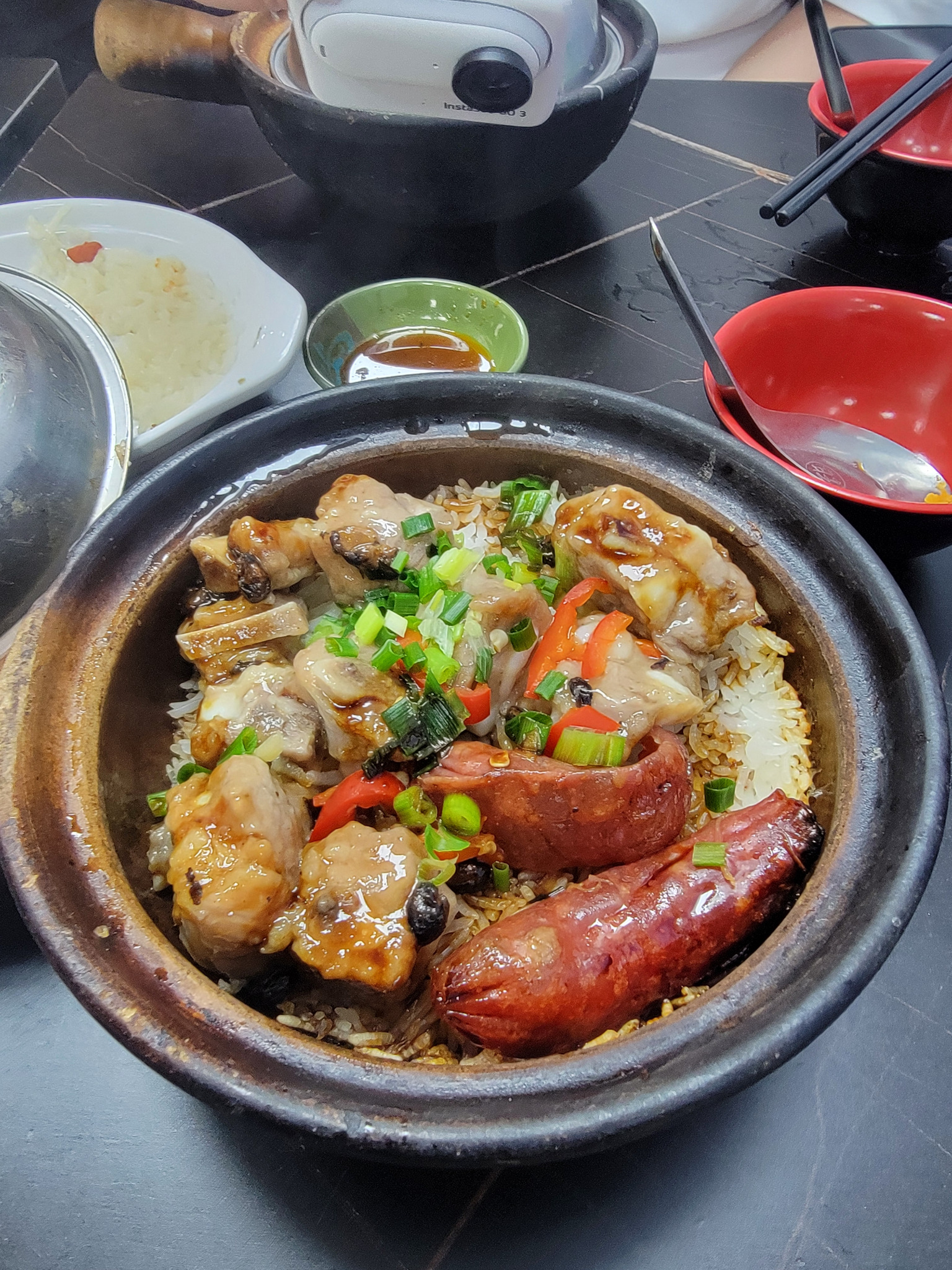 Bubbling claypot rice with sausage and ribs, Temple Street.
