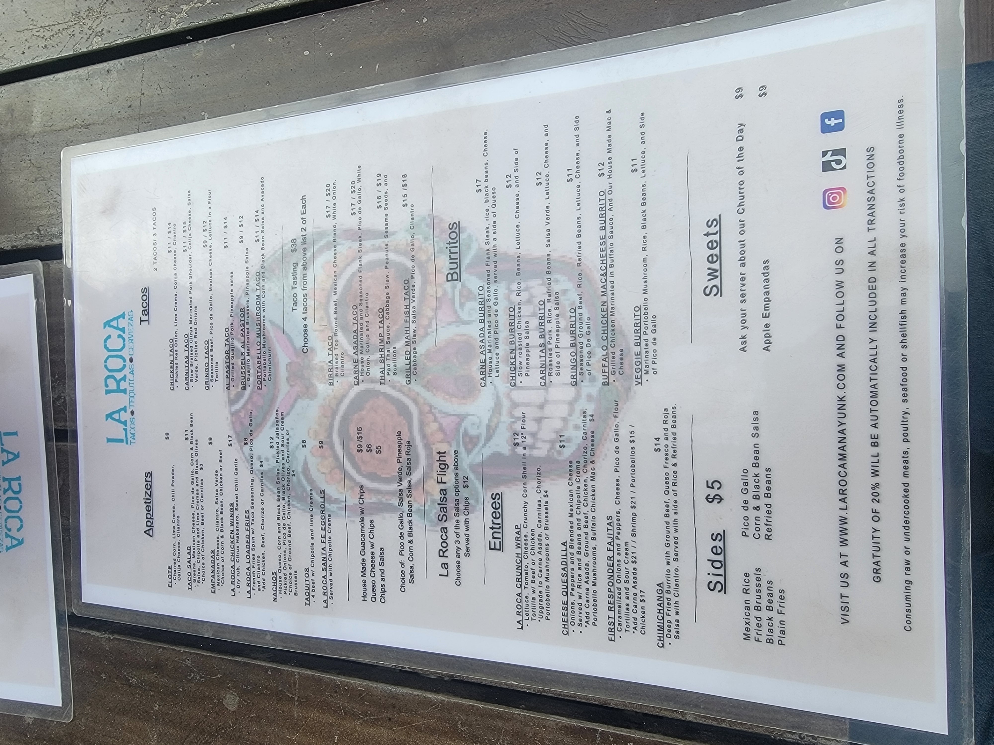 La Roca menu showing tacos, burritos, and sweets.